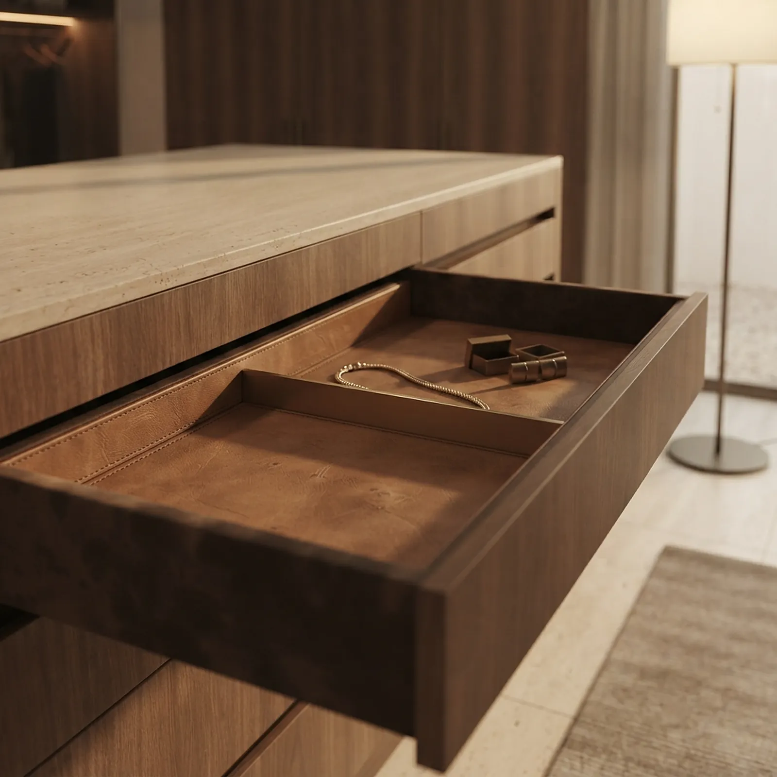Leather-lined drawer with brass divider