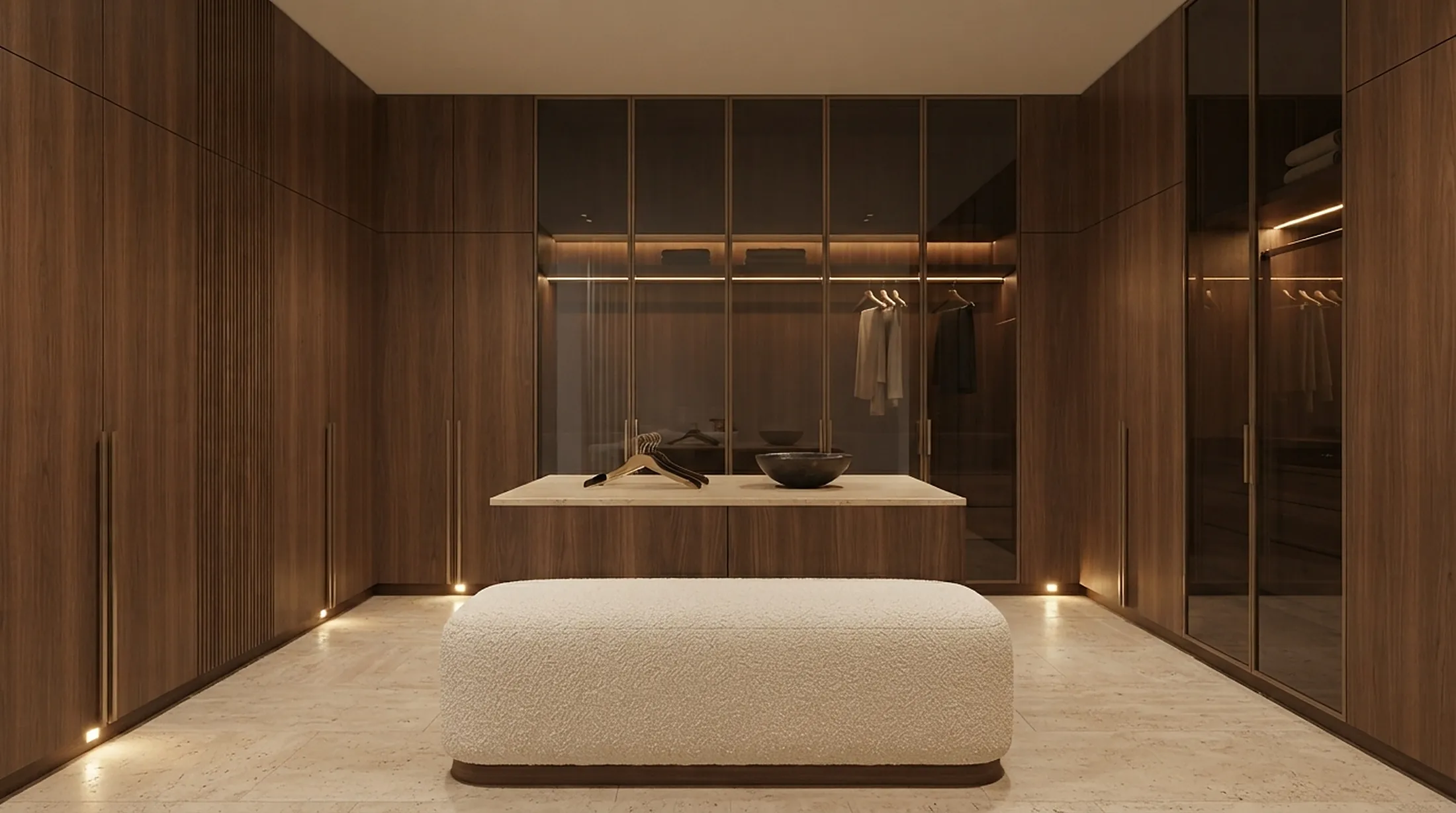Walk-in dressing room with walnut wardrobes, smoked glass and a central ottoman