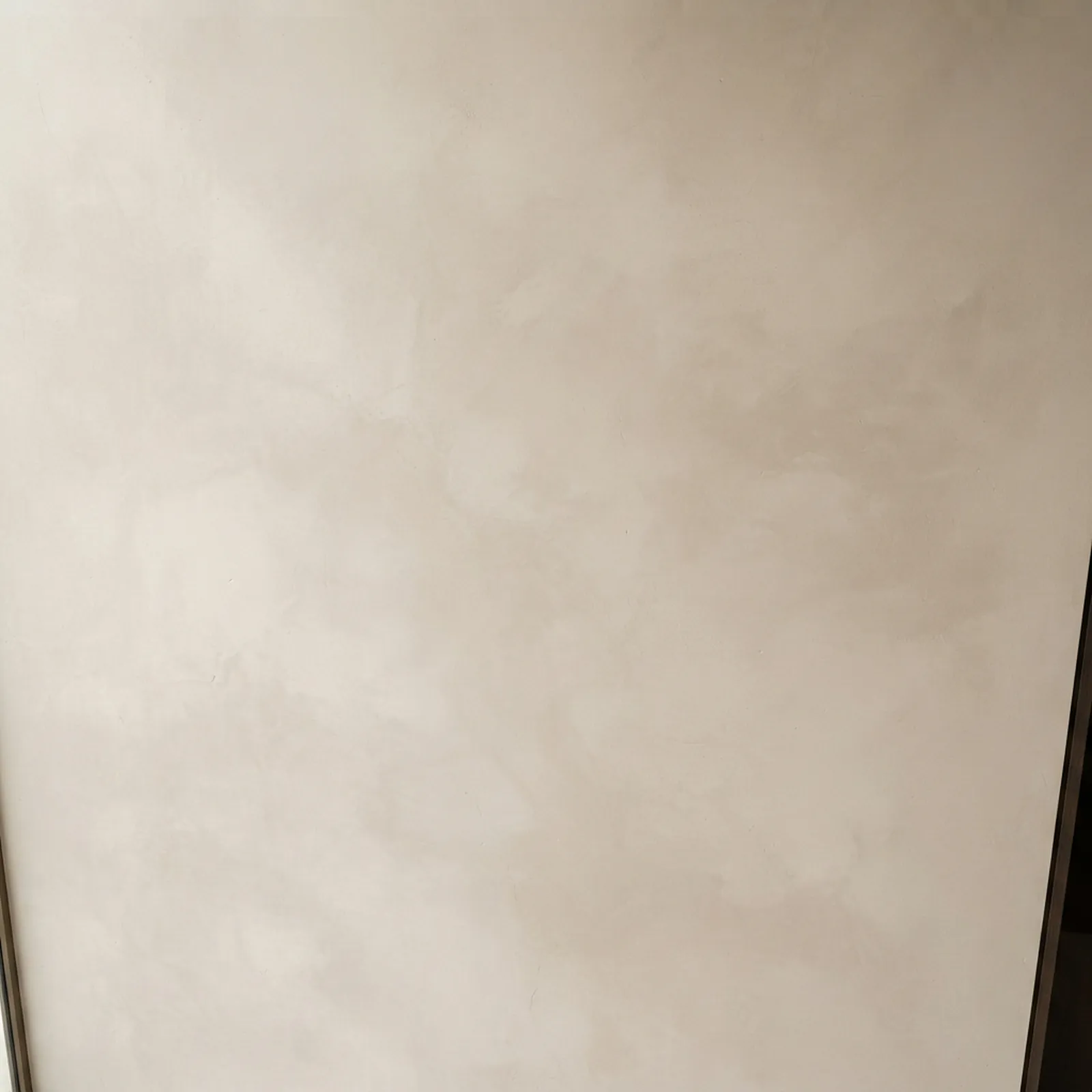 Lime-washed plaster wall